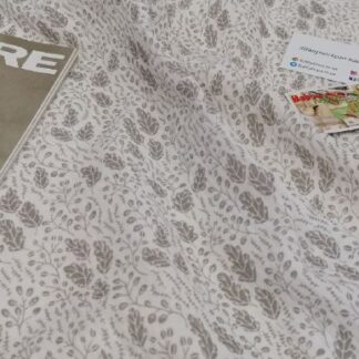 Муслін двошаровий листики на молочному  140 см арт. 3510